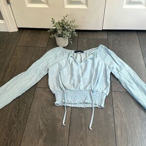 Woman’s Blue Rain blouse from Francesca’s